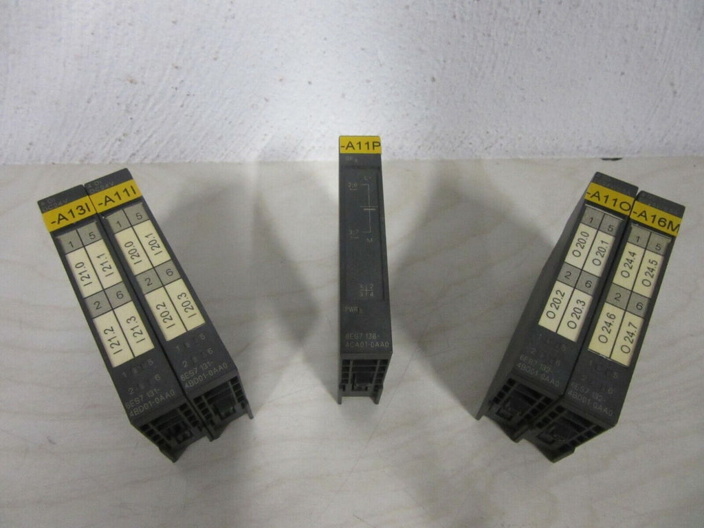 Siemens Simatic S7 6ES7: 2x 131-4BD01-0AA0 1x 138-4CA01-0AA0 2x 132-4BD01-0AA0 